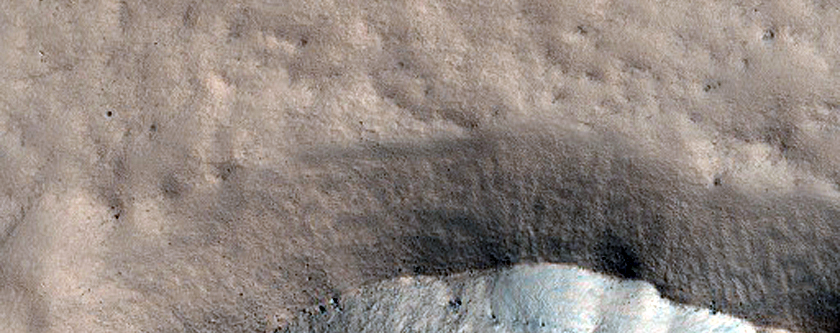 Impact Crater on Northern Plains
