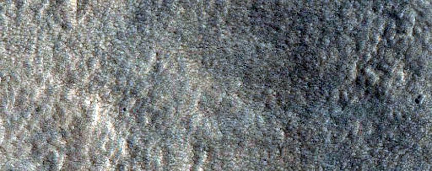 Rim and Ejecta of Well-Preserved Impact Crater
