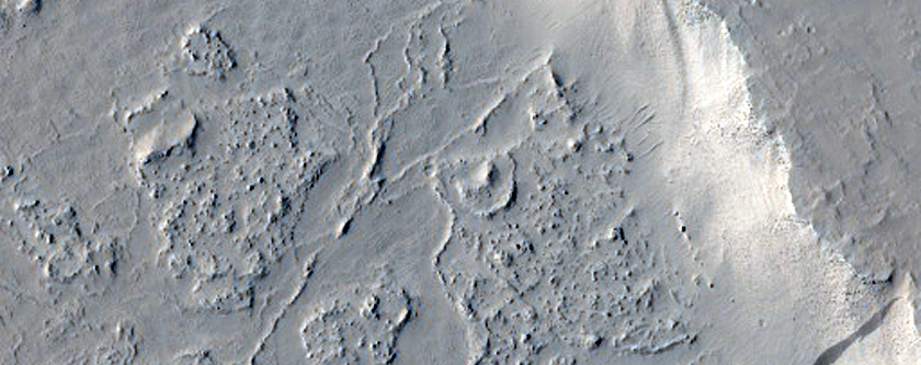 Pits and Lava in Amazonis Planitia
