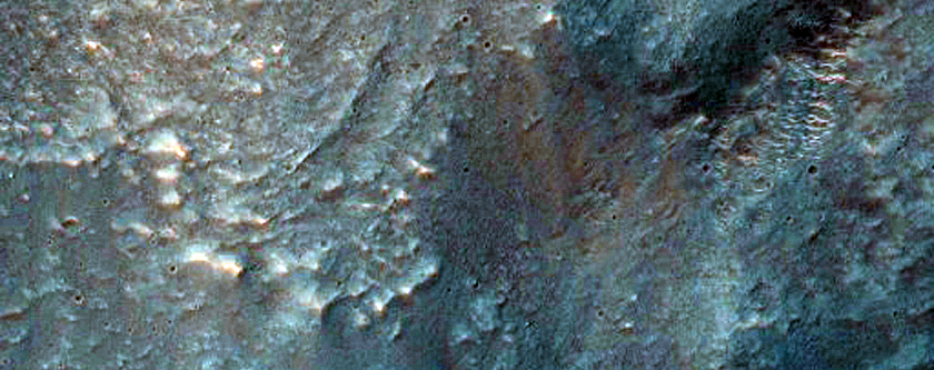 Light-Toned Deposits Exposed along Northern Melas Chasma Wall
