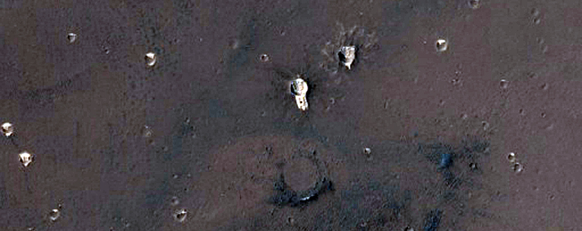 Possible Layers Under Ejecta Lobe in Syria Planum
