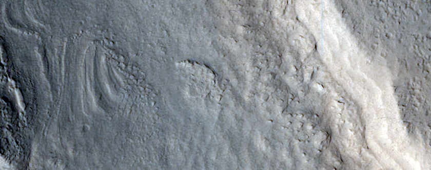 Valleys and Fractures on Alba Mons
