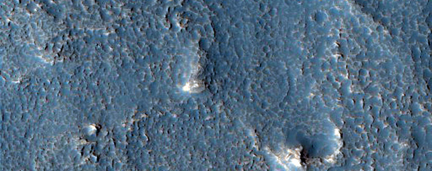Streamlined Shapes South of Moreux Crater

