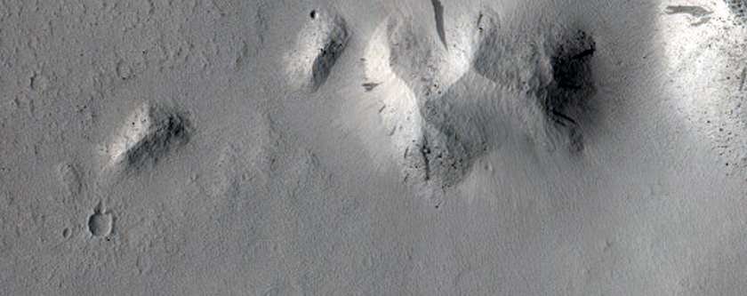Breached Crater Near Marte Vallis
