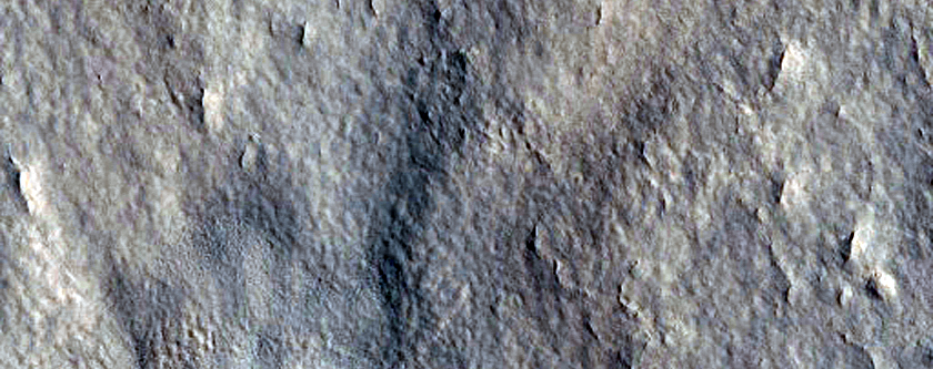 Moderately Degraded Crater on Northern Plains
