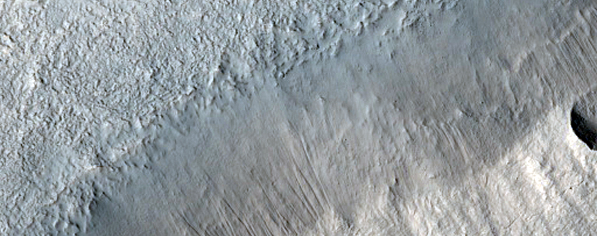 Layered Feature in Crater in Deuteronilus Mensae