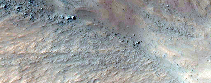 Scarp Exposing Bedrock
