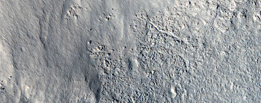Dipping Layers in Depression on Mesa in Deuteronilus Mensae