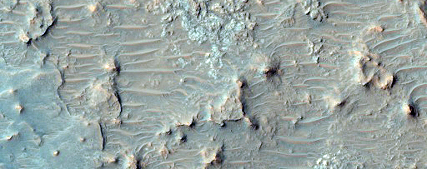 Dunes and Rocky Crater Floor
