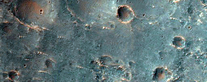 Small Outcrops on Plains North of Valles Marineris
