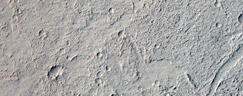 Fresh Crater Adjacent to Filled Crater
