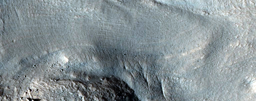 Surface Features around Eroded Crater in Deuteronilus Mensae
