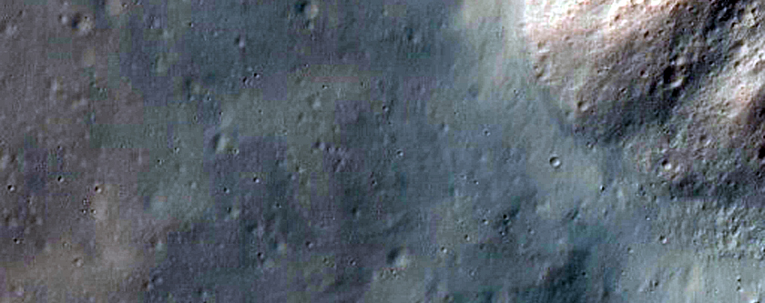 Well-Preserved Impact Crater with Gullies
