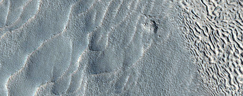 Dipping Layers in Crater within Moreux Crater
