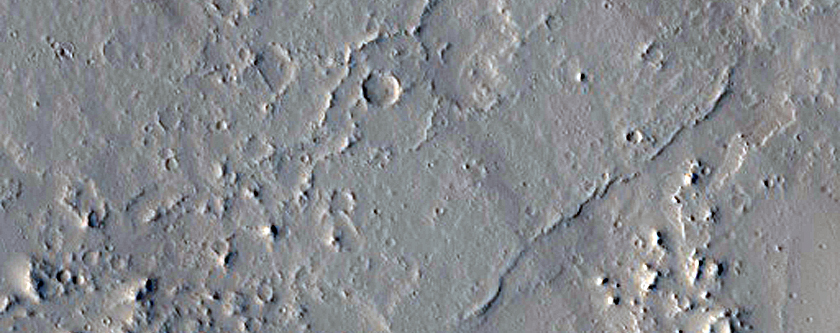 Lava Flow and Channels Near Olympica Fossae
