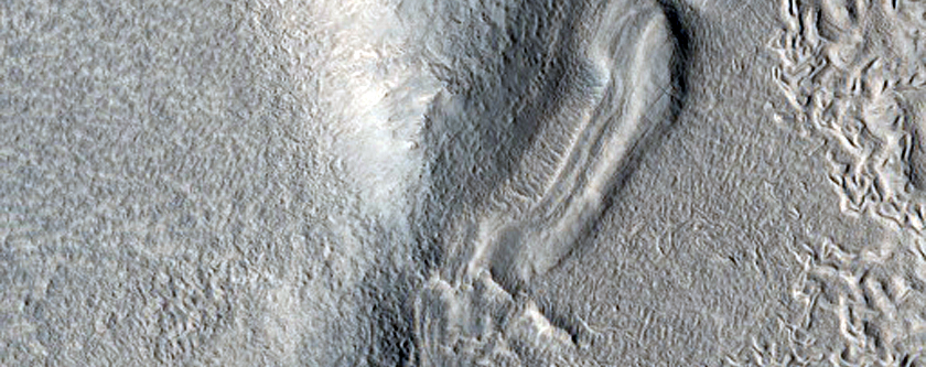 Dipping Layers along Mesas in Ismeniae Fossae
