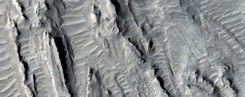 Possible Layering in a Depression in Northern Arabia Terra
