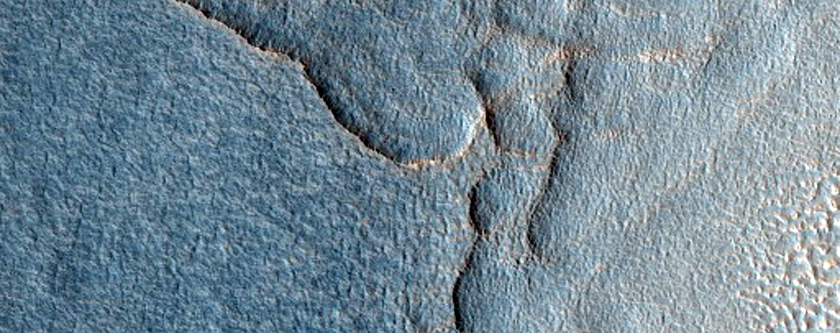 Aan de uiterste rand van het ejectiemateriaal van een impact-krater