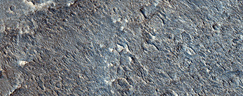 Shallow Channels Entering Collapse Terrain Near Orson Welles Crater