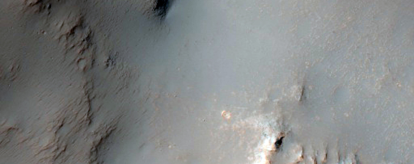 Flow Features from Near-Rim Ejecta of Bakhuysen Crater