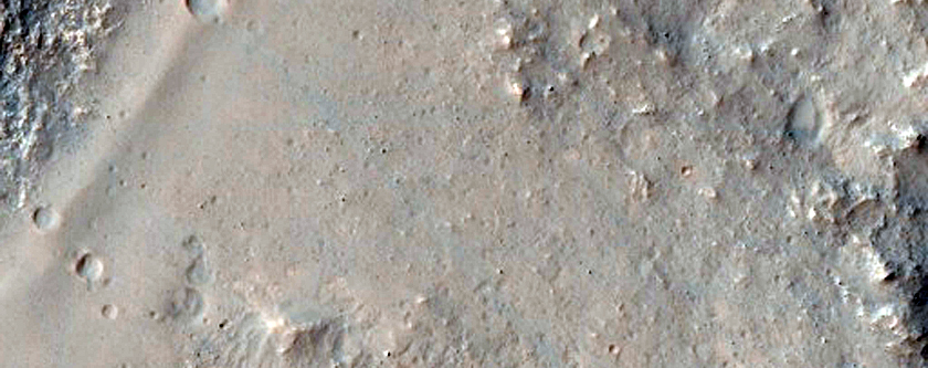 Contact between Layered Ejecta and Rocky Crater Fill
