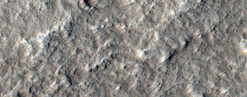 Dusty Lava Flows on the Flanks of Olympus Mons
