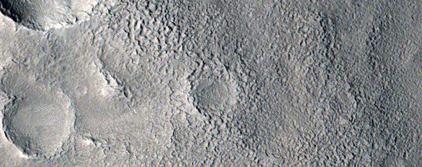 Dipping Layers around Central Mound of Northern Mid-Latitude Crater
