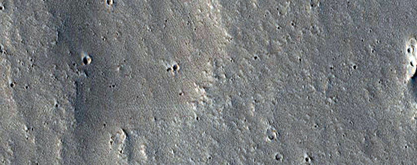 Flows Overlapping Crater Ejecta Blanket in Tharsis Region
