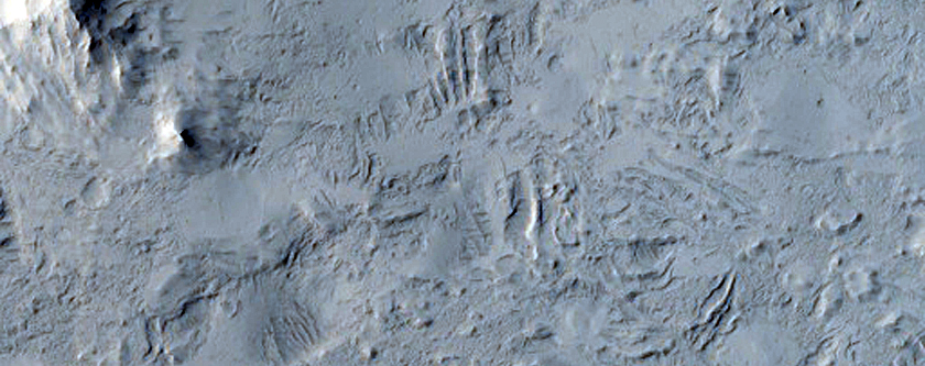 Layers Exposed in Wall of Crater in Lucus Planum
