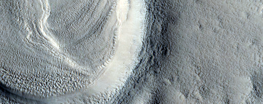 Layers in Small Crater in Northern Mid-Latitudes
