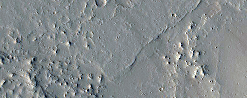 Lava Flow and Channels Near Olympica Fossae
