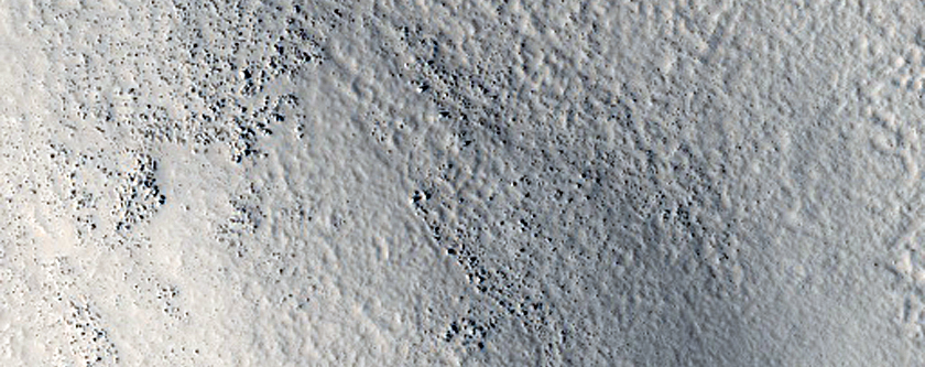 Hill Surrounded by Radial Channels in Southwestern Utopia Planitia
