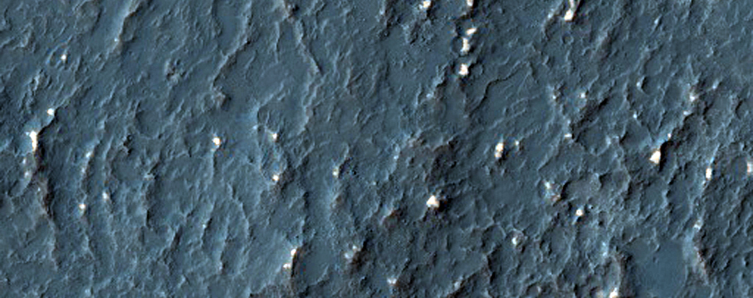 Small Hills or Blocks in Crater Ejecta Deposit
