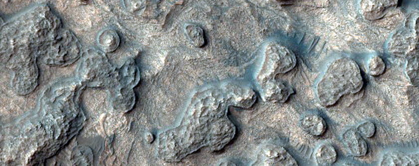 Layered Sediments in Crater North of Rabe Crater

