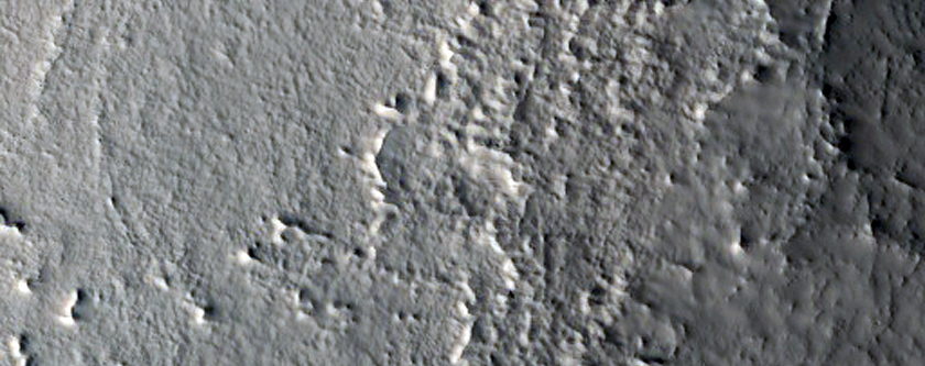Lineated Valley Floor Material in Coloe Fossae
