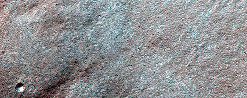 Spot Development Influenced by Underlying Terrain in Crater
