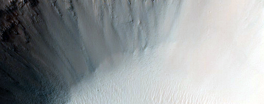 Crater in Ladon Valles Basin
