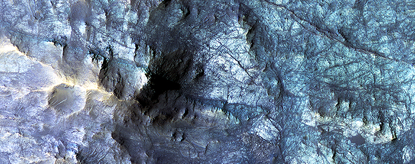 Exposed Fractured Bedrock in the Central Pit of a Crater