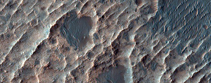 Curved Ridge and Layered Materials in CTX Image