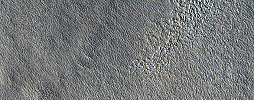 Hill in Erebus Montes
