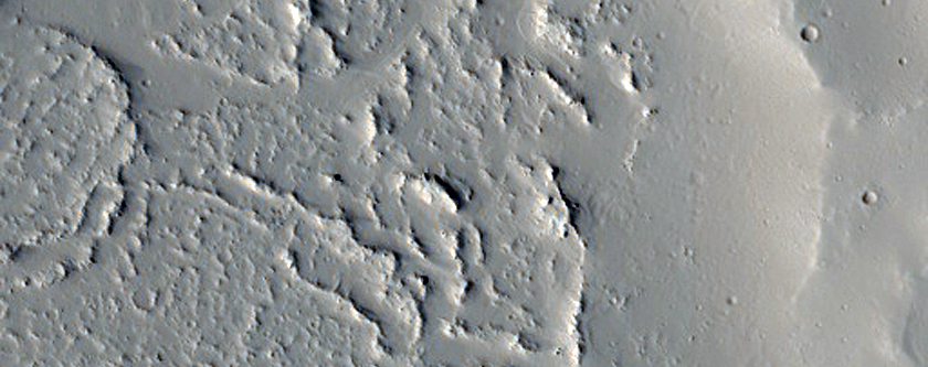 Lava Flow and Crater Ejecta in Northwest Tharsis Region
