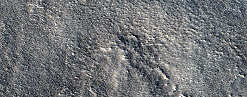 Layered Features Northwest of Galaxias Colles
