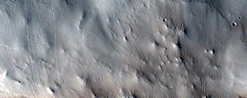 Layers in Crater East of Cassini Crater

