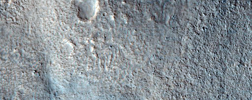 Dipping Layers Against Mesa in Deuteronilus Mensae
