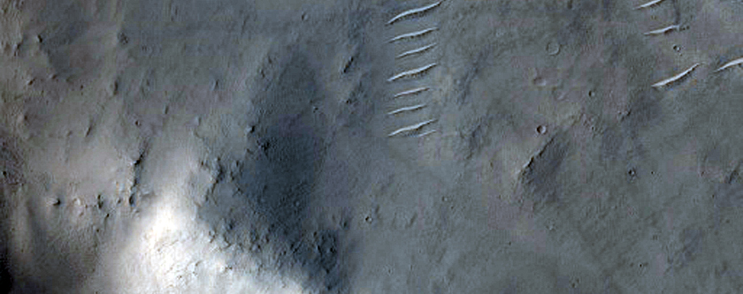 Spectrally Anomalous Wall of Small Crater
