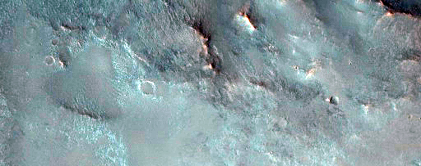 Impact Crater with Central Structure in Syrtis Major
