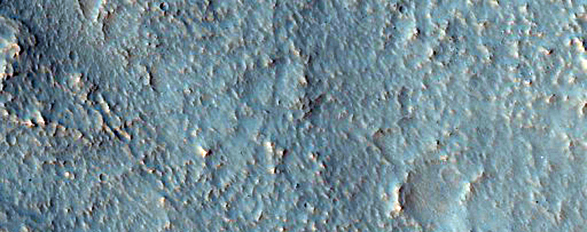 Radial Gullies within Heavily Eroded Crater in Noachis Terra

