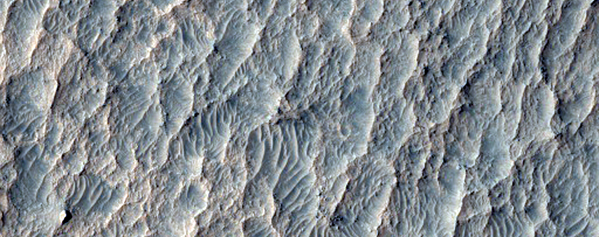 Layered Rocks on Crater Floor
