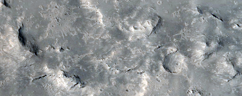 Layers Exposed in Depression in Aeolis Planum
