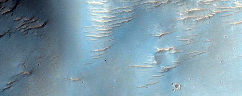 Channels and Layers North of Hellas Planitia

